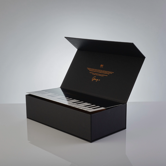 Open view of the high-quality, handmade, and embossed Gary Barlow piano box, showcasing its elegant design and signature interior details.