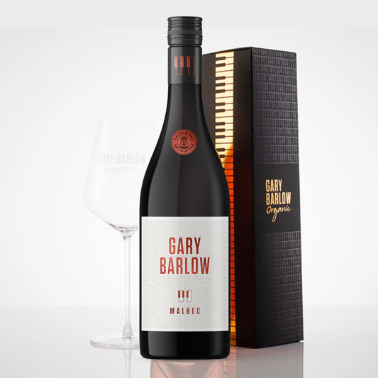 Gary Barlow Malbec Solo Piano Box gift set featuring a bottle of Malbec, an elegant wine glass, and a high-quality handmade embossed piano box.