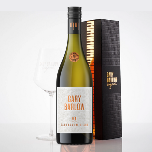 Gary Barlow Sauvignon Blanc gift set, featuring a bottle of Sauvignon Blanc, an elegant wine glass, and a luxurious handmade embossed piano box.