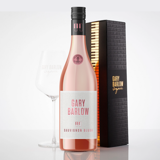 Gary Barlow Sauvignon Blush gift set featuring a bottle of Sauvignon Blush, an elegant wine glass, and a luxurious handmade embossed piano box.